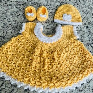 Handcrafted crochet baby dress